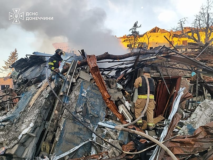 Emergency services personnel work to extinguish a fire following a Russian guided bomb strike in Sloviansk, 31 August, 2026