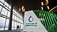 QatarEnergy branding at an international LNG conference.