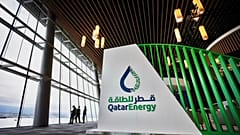 QatarEnergy branding at an international LNG conference.