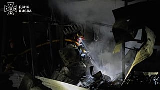 Firefighters put out a fire following a Russian missile attack in Kyiv, 1 September, 2026