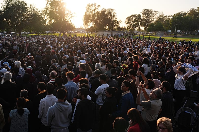 People attend a vigil the day after a shooting outside the Islamic Centre of San Diego, 19 May, 2026