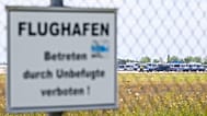 Police vehicles parked along the north runway at Leipzig/Halle Airport, 6 August, 2026