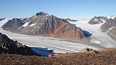 South facing view of the Malmbjerg molybdenum deposit. The molybdenum deposit outcrops as indicated by the lighter staining.