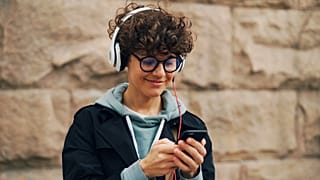 Casual young person using a smartphone
