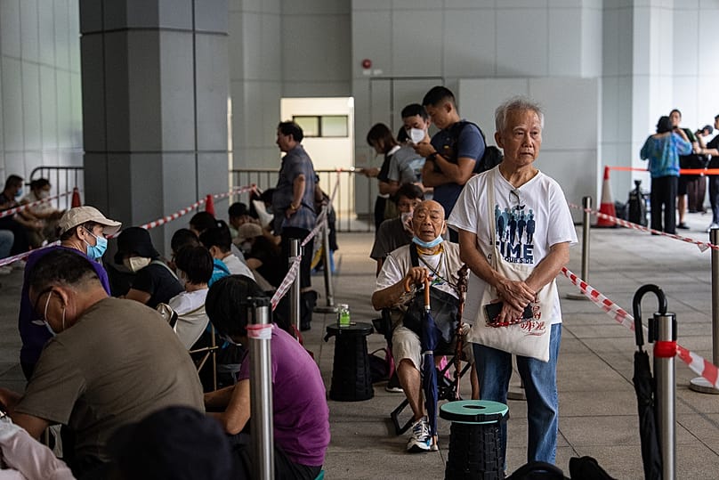 Members of public wait to enter the High Court in Hong Kong, Wednesday, 2 September, 2026