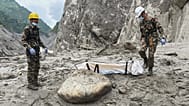 Nepal Army soldiers carry a body of a worker recovered from the site of a hydropower project in Upper Trishuli, Nepal, Tuesday, 1 September, 2026