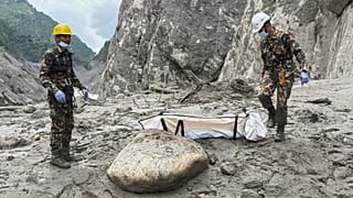 Nepal Army soldiers carry a body of a worker recovered from the site of a hydropower project in Upper Trishuli, Nepal, Tuesday, 1 September, 2026