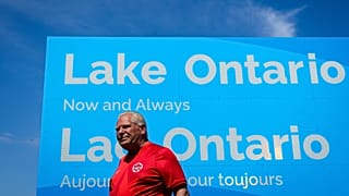 FILE - Ontario Premier Doug Ford unveils a sign for Lake Ontario at Fifty Point Conservation Area in Grimsby, Ontario, Canada, on Saturday, Aug. 29, 2026. 