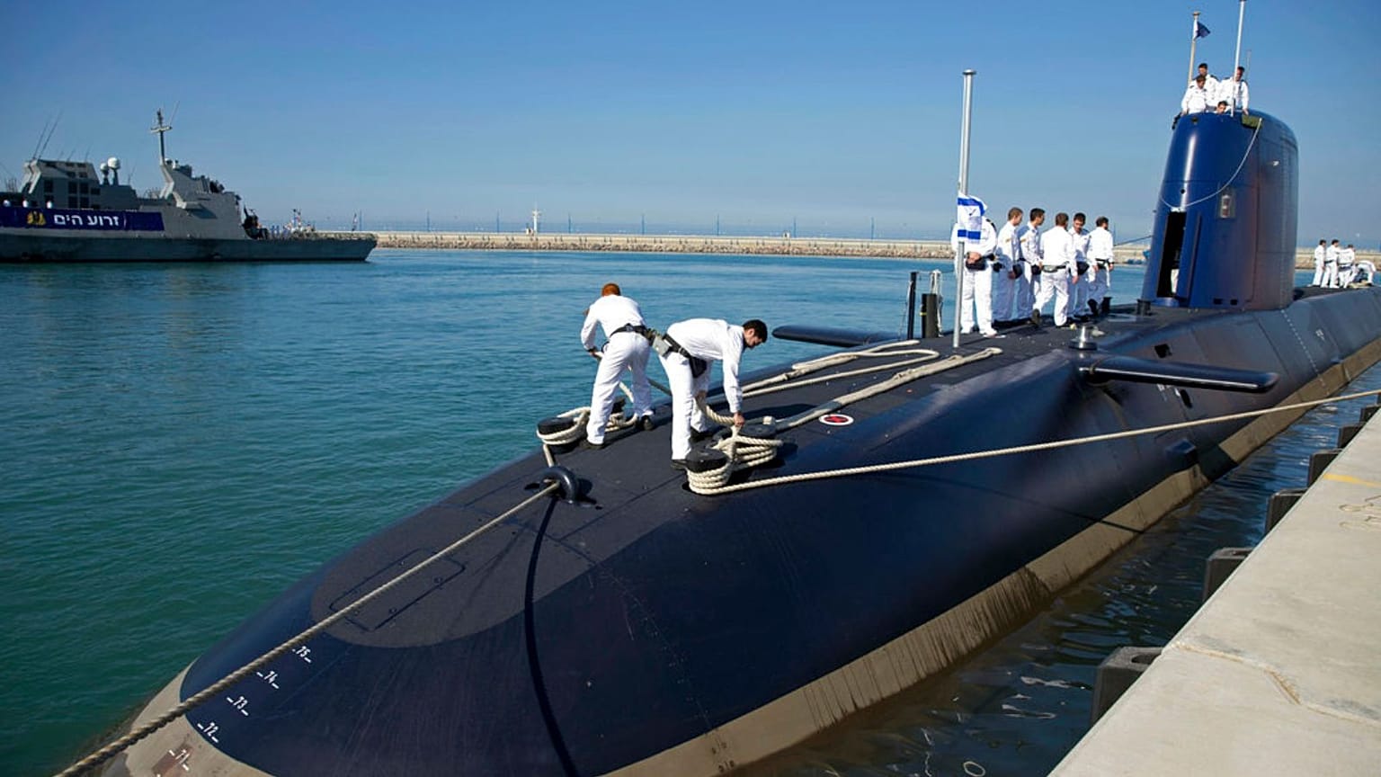 Israeli sailors stand on a German-built "Rahav" submarine 