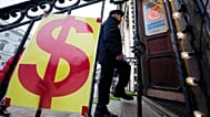 FILE: A man enters a currency exchange office in St Petersburg, 28 December 2024