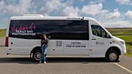 Blanche Mortemard, Icelandair’s ‘really bad photographer’, stands in front of her tour bus