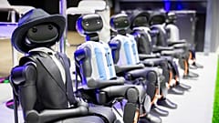 Robots from the company Booster sit on a small soccer field during the second press day of the IFA 2026 consumer electronic fair, IFA, in Berlin Thursday, Sept. 3, 2026.
