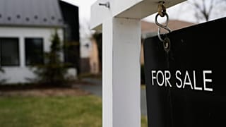 FILE - A for sale sign is displayed in front of a home in Evanston, Ill., on March 25, 2026. (AP Photo/Nam Y. Huh, File)