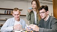 Young people working in an office together. 