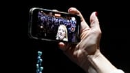 Giorgia Meloni of the Brothers of Italy party records a selfie video during the centre-right coalition's final rally in Rome on Thursday, 22 Sept 2022.