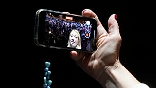 Giorgia Meloni of the Brothers of Italy party records a selfie video during the centre-right coalition's final rally in Rome on Thursday, 22 Sept 2022.
