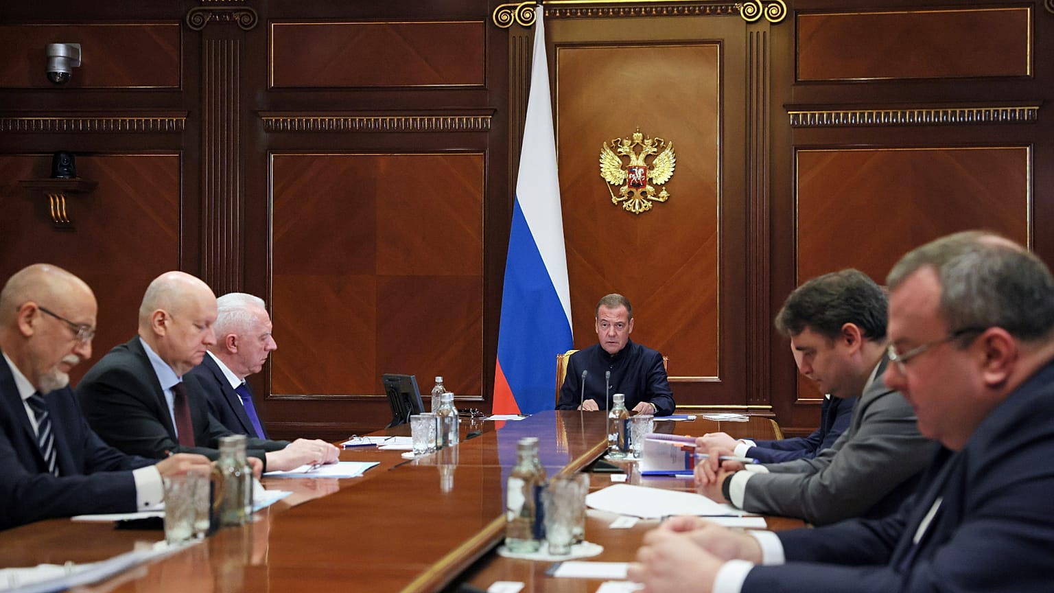 Russian Security Council Deputy Chairman Dmitry Medvedev, center, leads a meeting on countering Western sanctions against Russian companies on Friday, July 31, 2026.