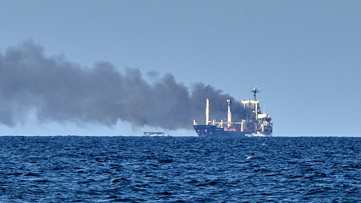 Smoke rises from the grain carrier Golden Leo after Russian missile strike in the Black Sea close to Odesa, Ukraine,