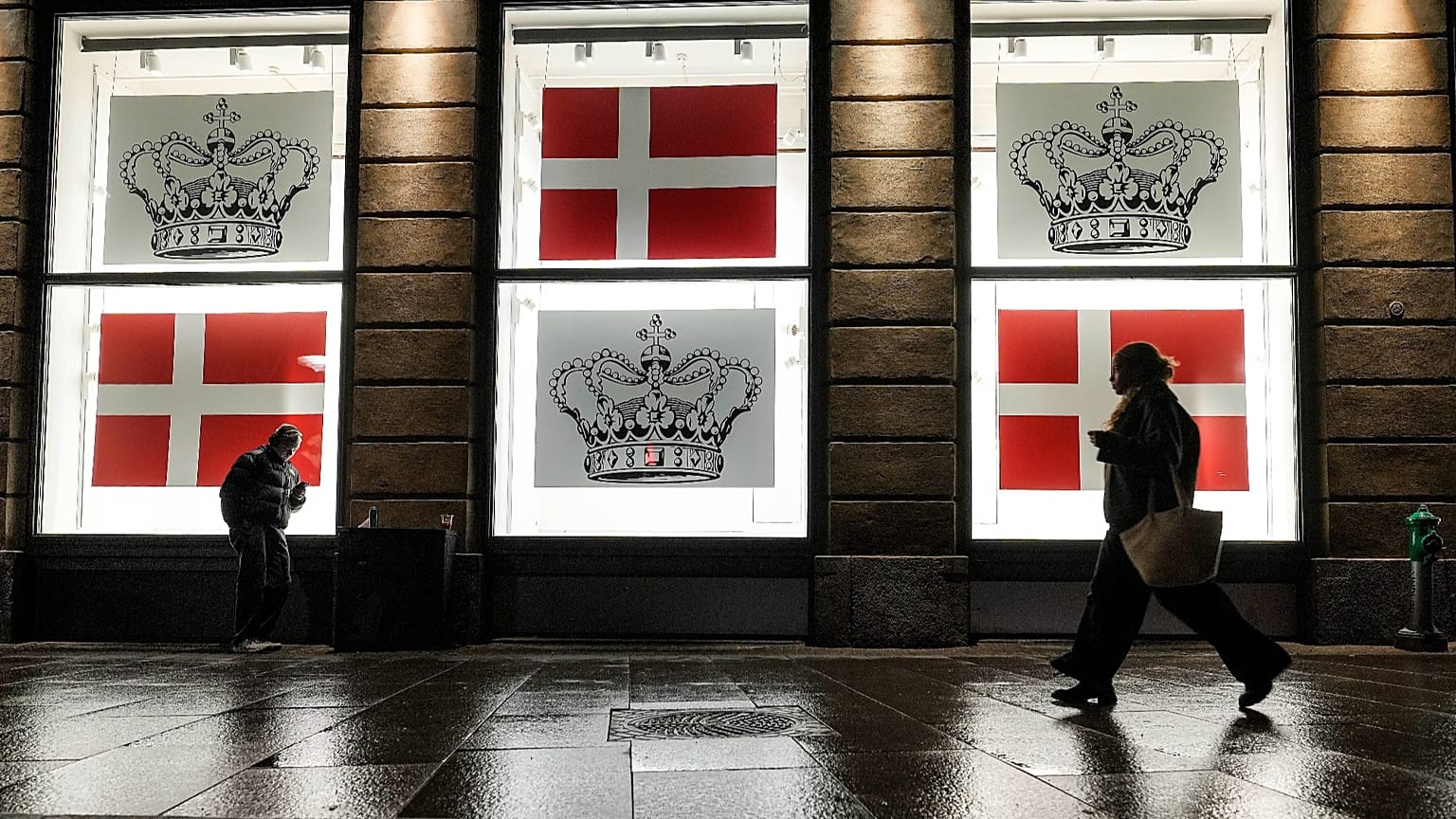 Department store windows display the Danish flag and the Danish crown in Copenhagen, 13 January, 2024