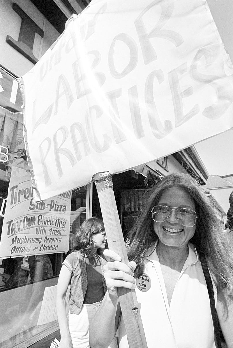 Gloria Steinem marches with members of striking telephone answering service operators from Americall - Massachusetts - 7 July 1982