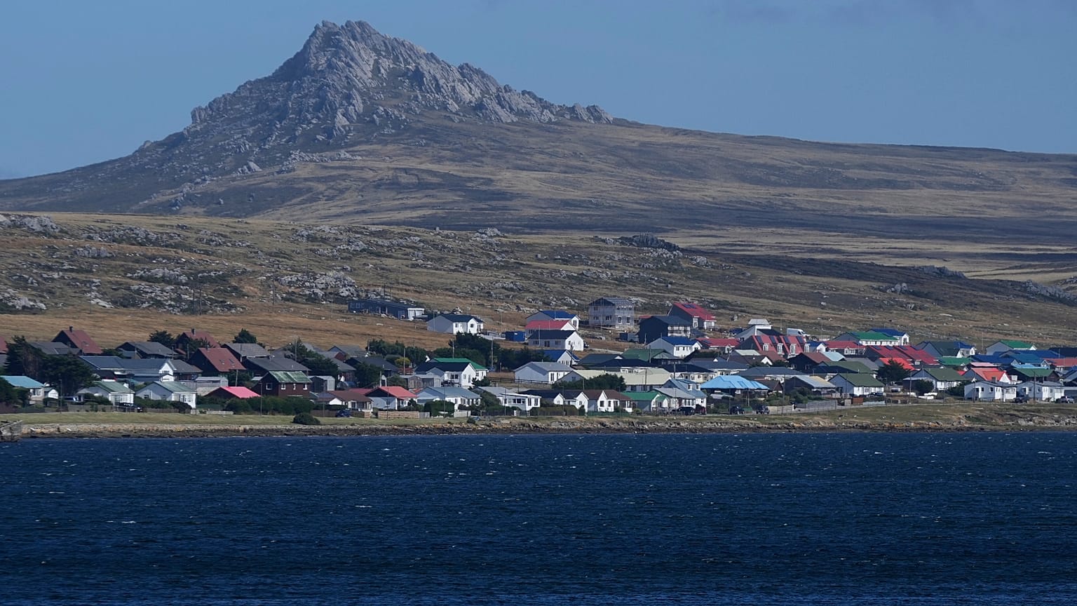 Mount Tumbledown stands tall behind Stanley on the Falkland Islands, also known as Islas Malvinas, Monday, March 16, 2026. 