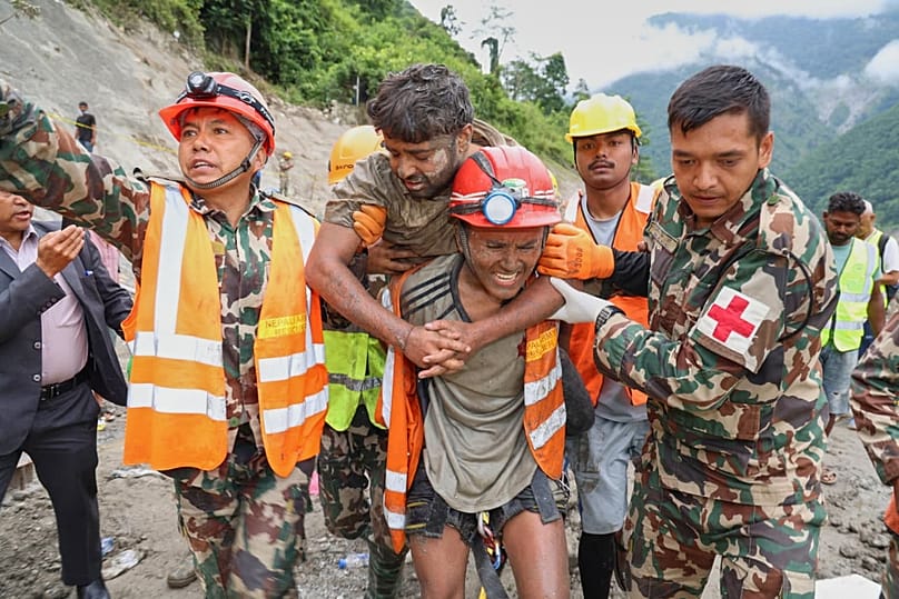 Soldiers rescue a worker from a tunnel during an ongoing operation at the Trishuli-3A hydropower project in Nepal's Rasuwa district, 4 September, 2026