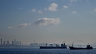 Cargo ships anchored in the Marmara Sea wait to cross the Bosphorus Straits in Istanbul, 1 November, 2022