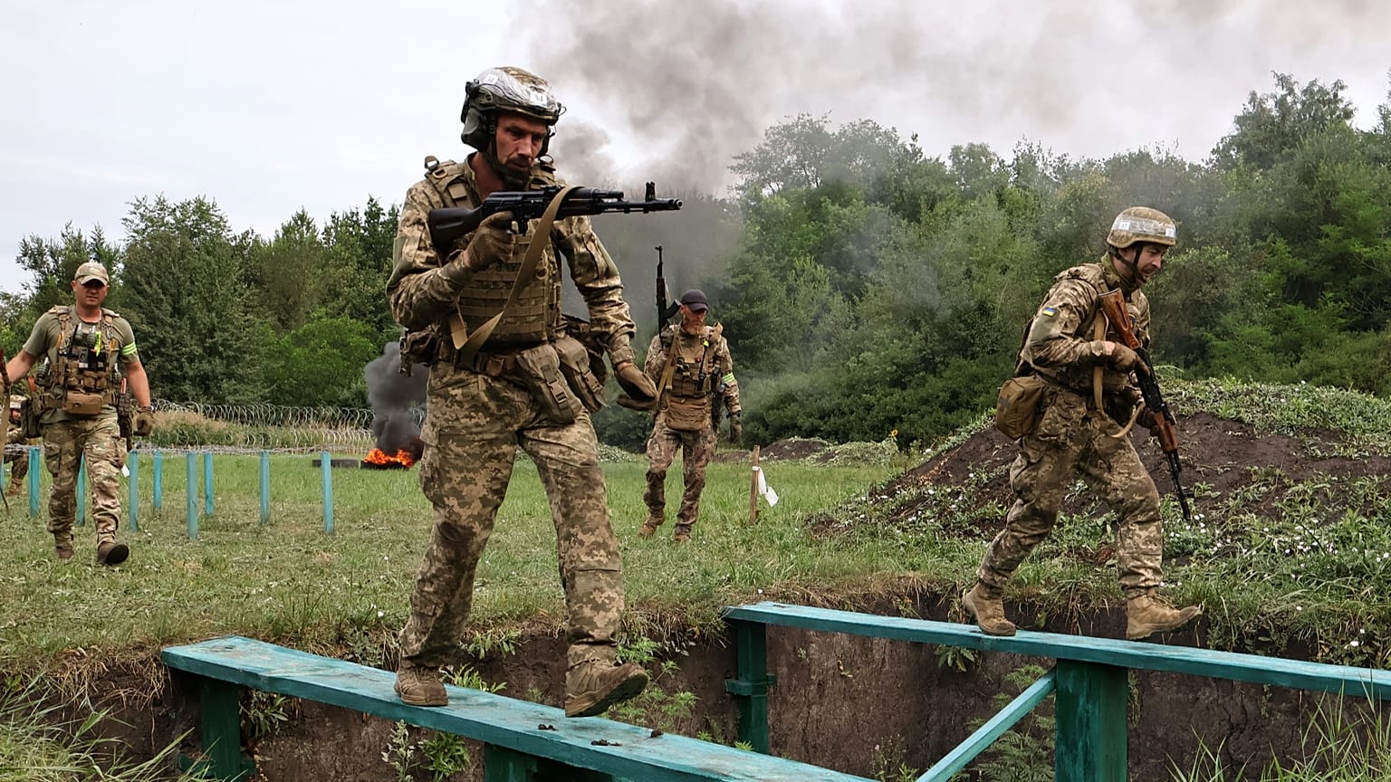 Soldiers practice military skills at a training ground near the frontline in the Zaporizhzhia region, 24 July, 2026