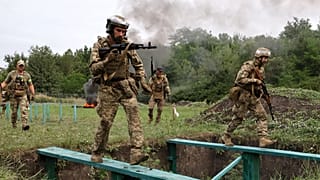 Soldiers practice military skills at a training ground near the frontline in the Zaporizhzhia region, 24 July, 2026