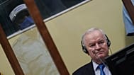 FILE: Former Bosnian Serb military chief Ratko Mladic sits in the court room in The Hague, Netherlands, 8 June 2021