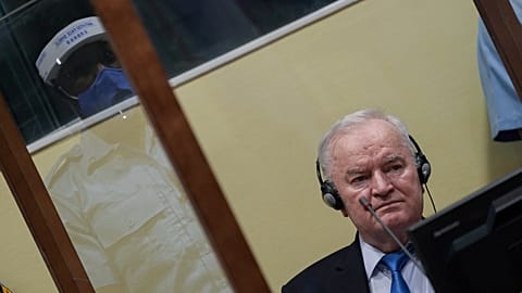 FILE: Former Bosnian Serb military chief Ratko Mladic sits in the court room in The Hague, Netherlands, 8 June 2021