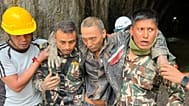  Chinese national is seen after being rescued by soldiers during an ongoing operation at the Trishuli-3A hydropower project in Nepal's Rasuwa district, Saturday, Sept. 5, 2026