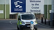 A police van parked outside the migrant processing centre in Dover, England, Monday, Oct. 31, 2022.