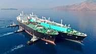 LNG carriers conduct a ship-to-ship transfer.