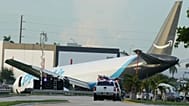 An Amazon cargo plane sits at the Miami International Airport (MIA) after it overshot the runway, Sunday, Sept. 6, 2026.