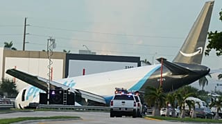 An Amazon cargo plane sits at the Miami International Airport (MIA) after it overshot the runway, Sunday, Sept. 6, 2026.