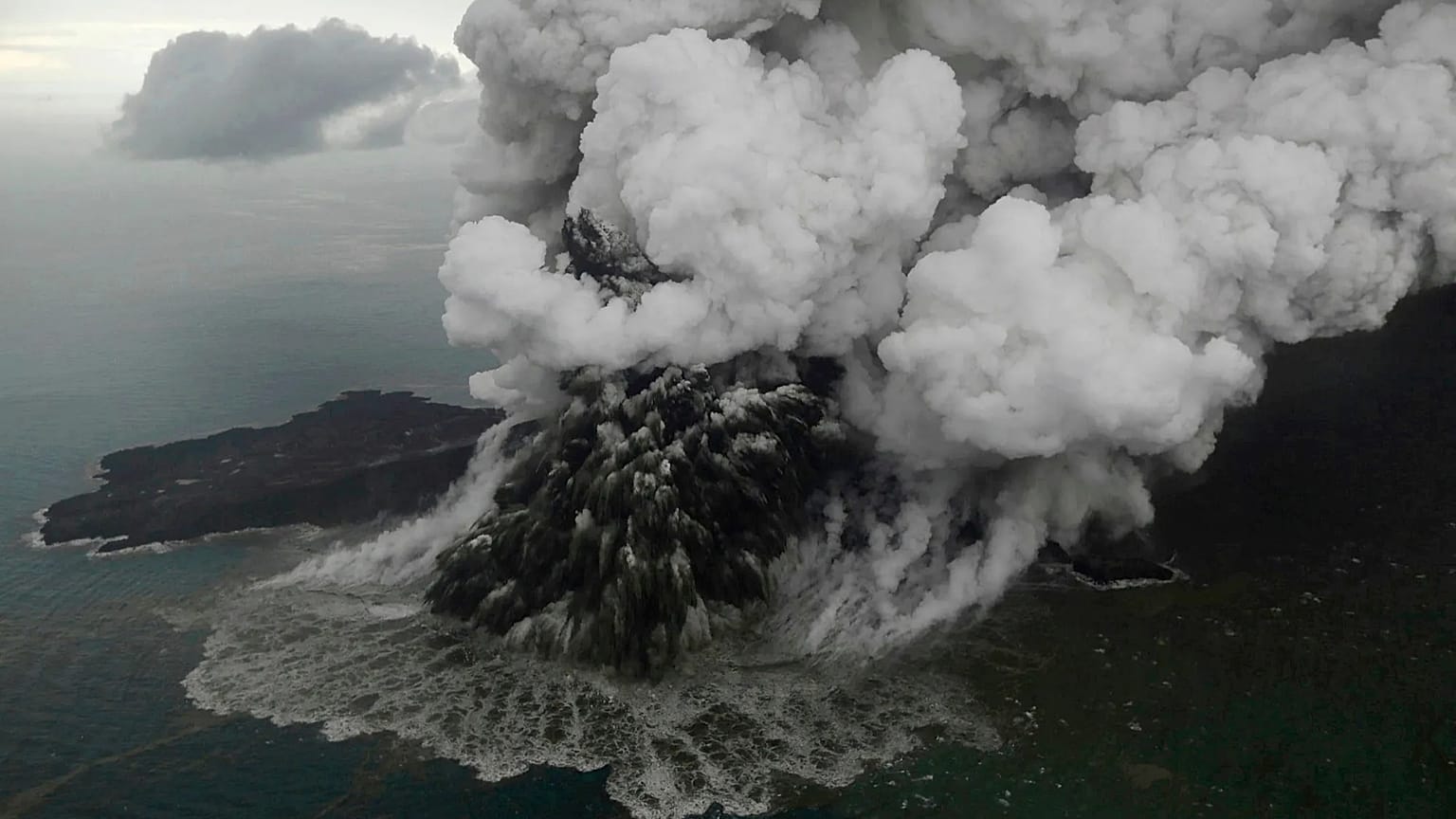  Plumes rise from Mount Anak Krakatau as it erupts in the Java Strait, Indonesia on Sunday, Dec. 23, 2018.