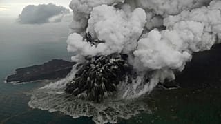  Plumes rise from Mount Anak Krakatau as it erupts in the Java Strait, Indonesia on Sunday, Dec. 23, 2018.