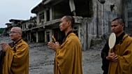 Buddhist monks offer prayers for the departed soul of the victims of flash flood on the bank of Trishuli river in Devighat, 5 September, 2026