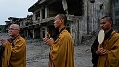 Buddhist monks offer prayers for the departed soul of the victims of flash flood on the bank of Trishuli river in Devighat, 5 September, 2026