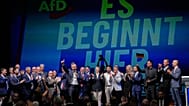 Top AfD candidate Ulrich Siegmund speaks in front of a reading "it starts here" at an election party of the "Alternative for Germany" (AfD) after the Saxony-Anhalt state elect