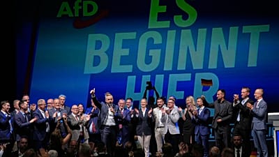 Top AfD candidate Ulrich Siegmund speaks in front of a reading "it starts here" at an election party of the "Alternative for Germany" (AfD) after the Saxony-Anhalt state elect