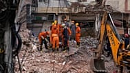 Rescue workers continue to search for people trapped under the debris of a collapsed building in New Delhi, 7 September, 2026