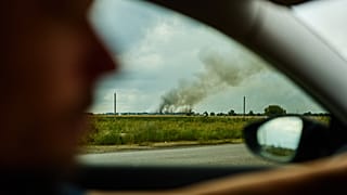 Smoke rises from a burning pharmaceutical warehouse following Russian drone attacks on the outskirts of Kyiv, Ukraine, Thursday, Sept. 3, 2026.