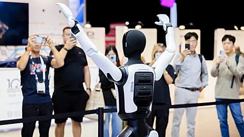 FILE - A robot dances at the Agibot booth during the second press day of the IFA 2026 consumer electronic fair, IFA, in Berlin Thursday, Sept. 3, 2026. 