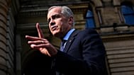 File - Canadian Prime Minister Mark Carney speaks with media as he arrives at the Office of the Prime Minister and Privy Council in Ottawa, on Tuesday, 1 Sept. 2026. 
