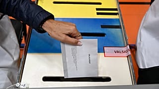 A ballot is cast at a polling station during the general elections in Stockholm, 11 September, 2022