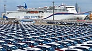 New cars wait to be transported on a dockyard in Yantai in eastern China's Shandong province.