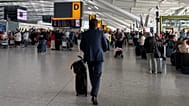 Passengers walk through Terminal 5 of London Heathrow Airport after flights were cancelled because of a technical issue in the air traffic control system, 8 September, 2026