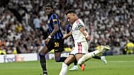 Real Madrid's Kylian Mbappe fights for the ball against Inter Milan's Yann Bisseck 